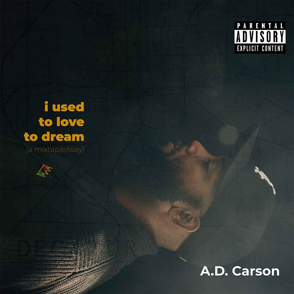 An album cover with the title "I used to love to dream" position to a rotated profile photo of the author/creator facing upwards. A map serves as the background. 