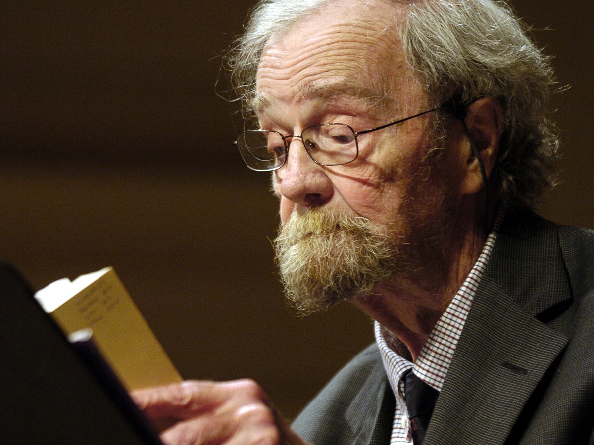 An image of Donald Hall reading from one of his texts. 