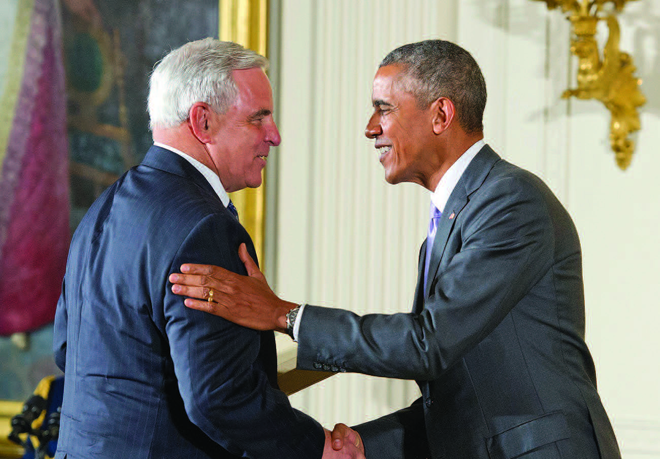 Ken Fischer of University Musical Society shakes hands with President Barack Obama